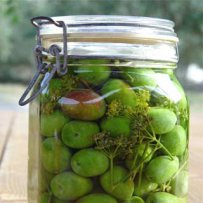 GREEN OLIVES IN A JAR
