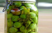 GREEN OLIVES IN A JAR