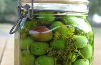 GREEN OLIVES IN A JAR