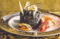 BLACK RISOTTO WITH TRUFFLES AND LEAVES OF GOLD, LOBSTER AND COCKLES