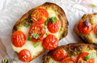 Bruschetta with grilled cherry tomatoes and Greek traditional cheese metsovone