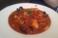 Potatoes with Mussels, Calamari and Tomato