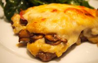 Finely Sliced Veal with Mushrooms and Cheese in the Oven