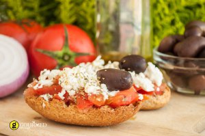 Rusks with tomatoes and Greek traditional cheese kopanisti from Mykonos