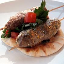 MINI KEBABS WITH SESAME AND TAHINI ON PITA BREAD