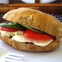 FOOD - ITALY - MOZZARELLA, TOMATO AND BASIL SANDWICH