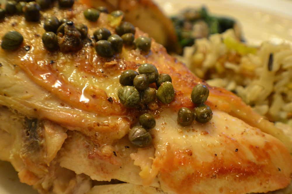 Chicken Breast cooked with Capers and Chunks of Lemon