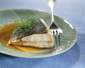Roast turbot with slightly spicy-hot tuber purée and acidulated wild-mushroom stock