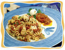 Fussili with sundried tomato sauce, mozzarella balls & herbs
