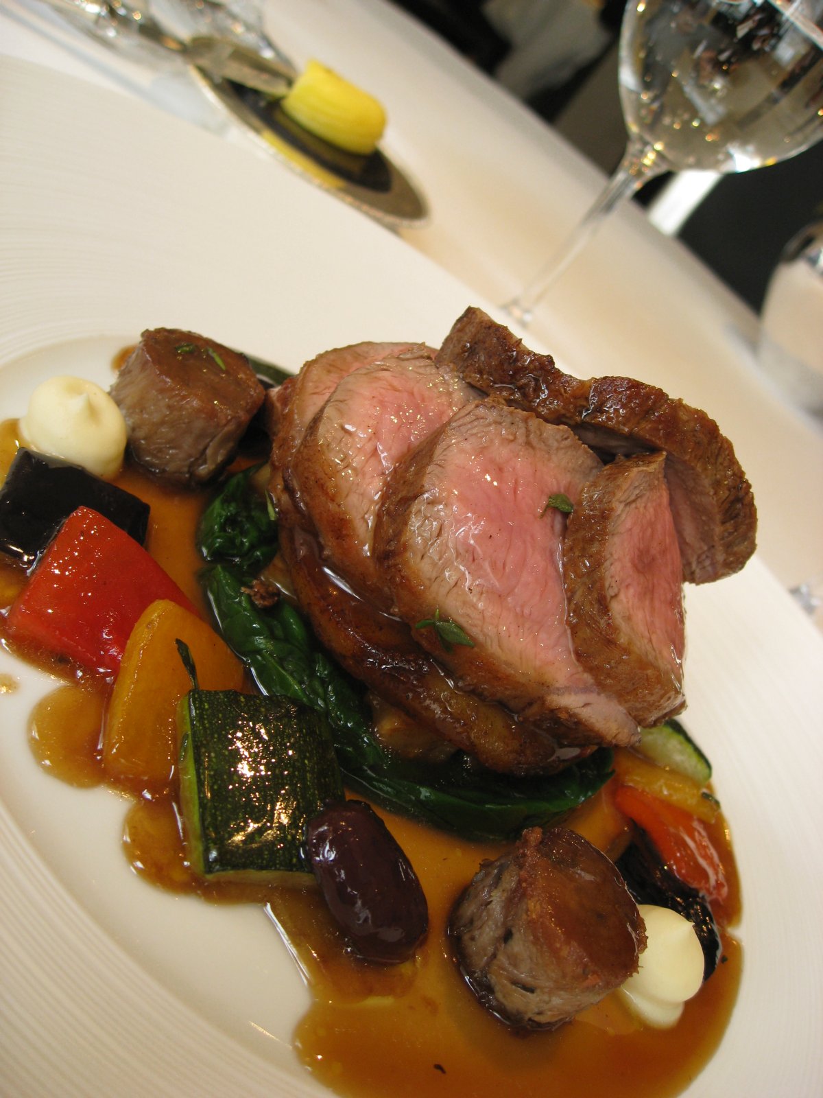 Lamb Stuffed with Vegetables in an Olive crust and Mint Sauce